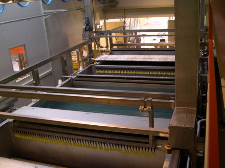 Treatment washing machine surface conversion