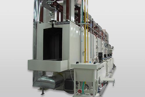 Tunnel washing machine overhead conveyor